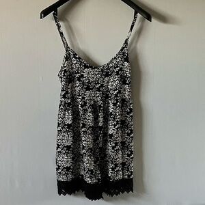 Xhilaration, woman’s floral print spaghetti strap romper, zip back, lace trim